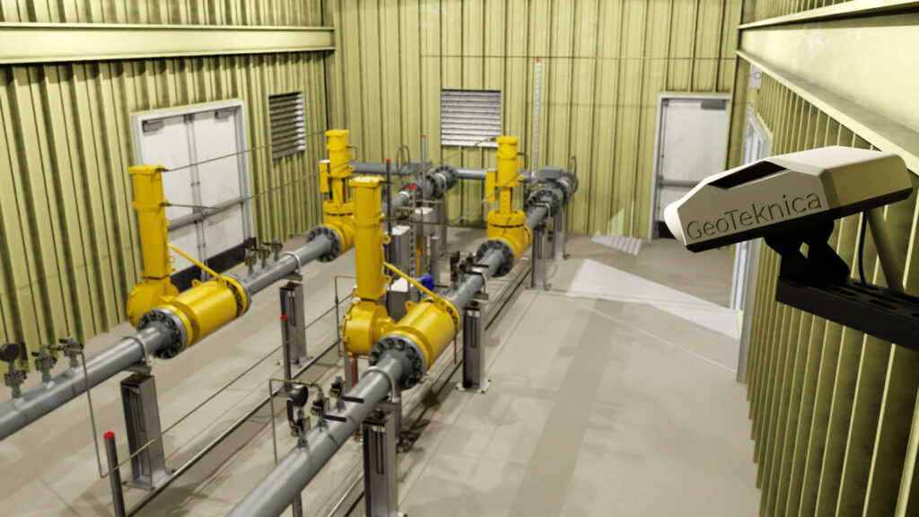 GeoTeknica methane monitoring sensor mounted near storage tanks and piping in an illustrative mock-up.